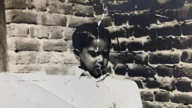 Sadat Khan when he came to the UK